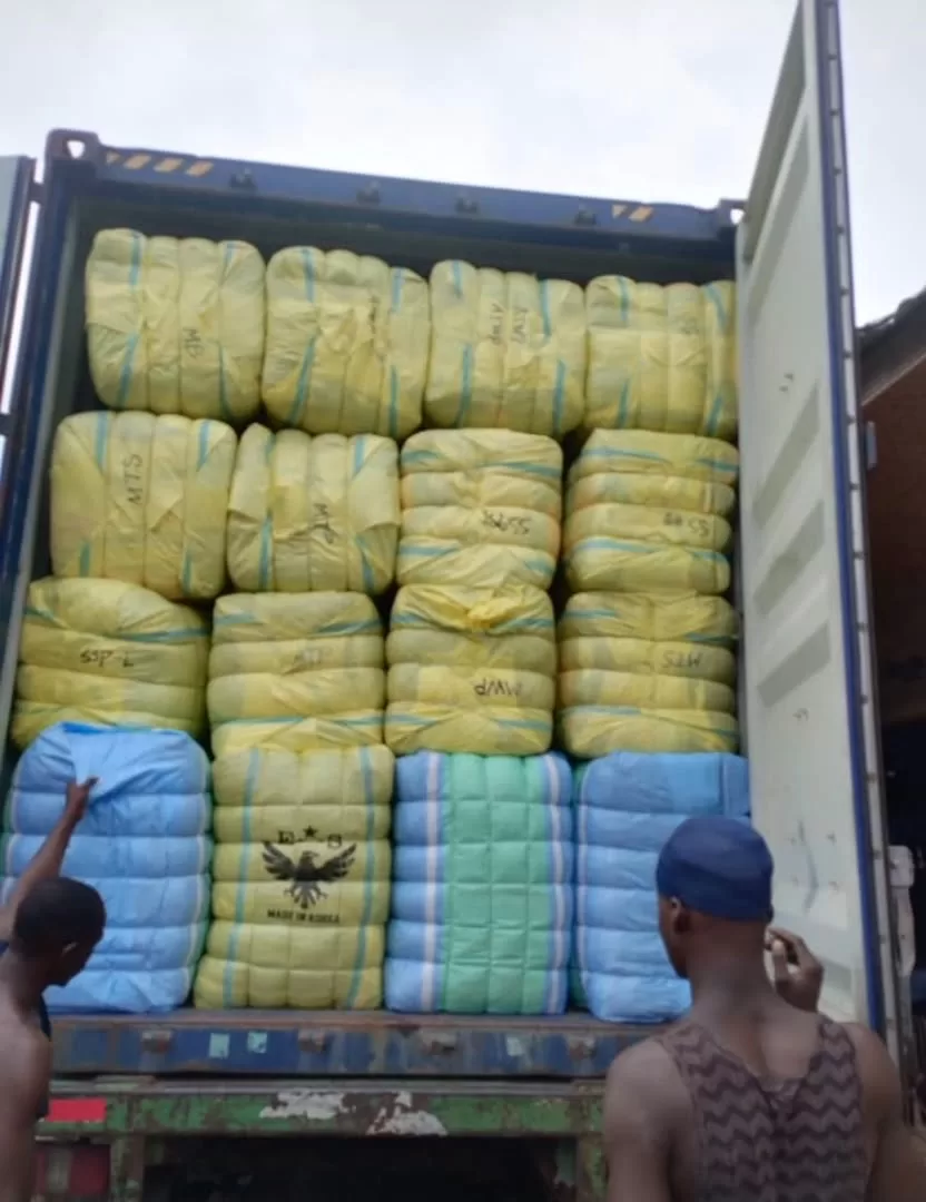 Children Okrika bales and slot