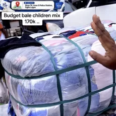 Children mix budget bale